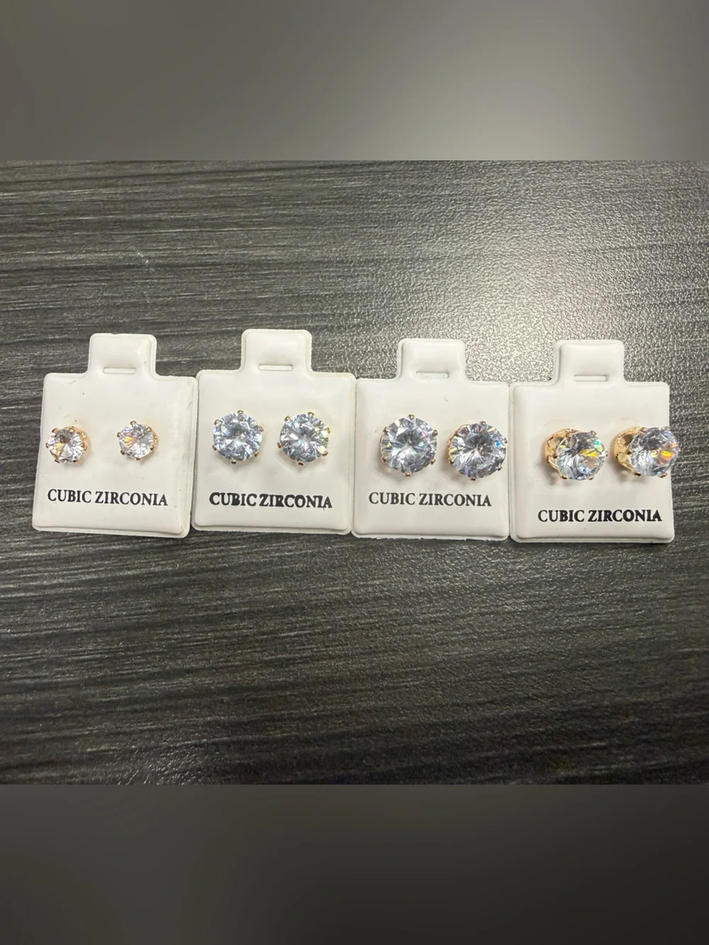 4 pairs of new gold toned CZ earring studs 5mm-8mm